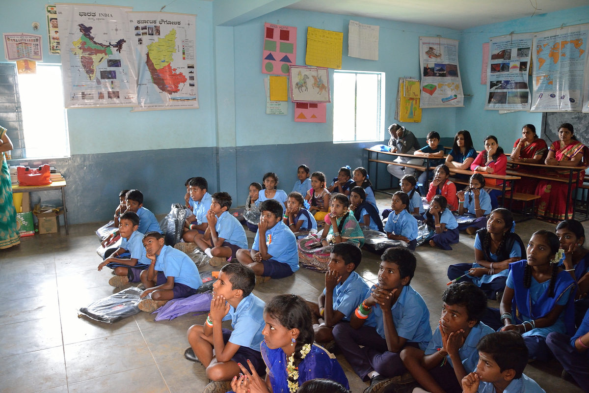 Children seated in a classroom